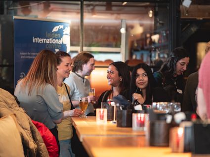 Photo of the Meet&Mingle in May 2023, you see people who are having a good time
