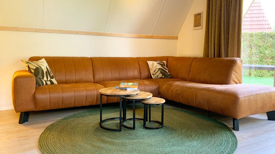 Ruime hoekbank vakantiehuisje Velduil
