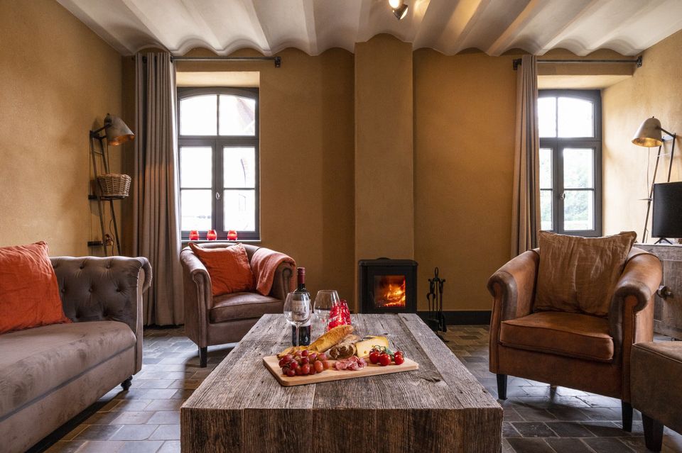 Hoeve Klinkenberg vakantiewoning interieur woonkamer zithoek