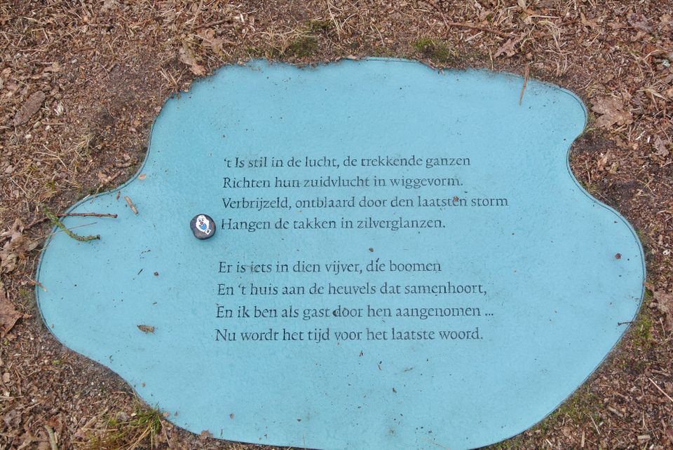 Vlieland glazen bord met tekst Slauerhoff Ganzen