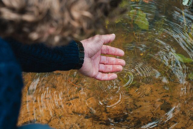 Hand in water