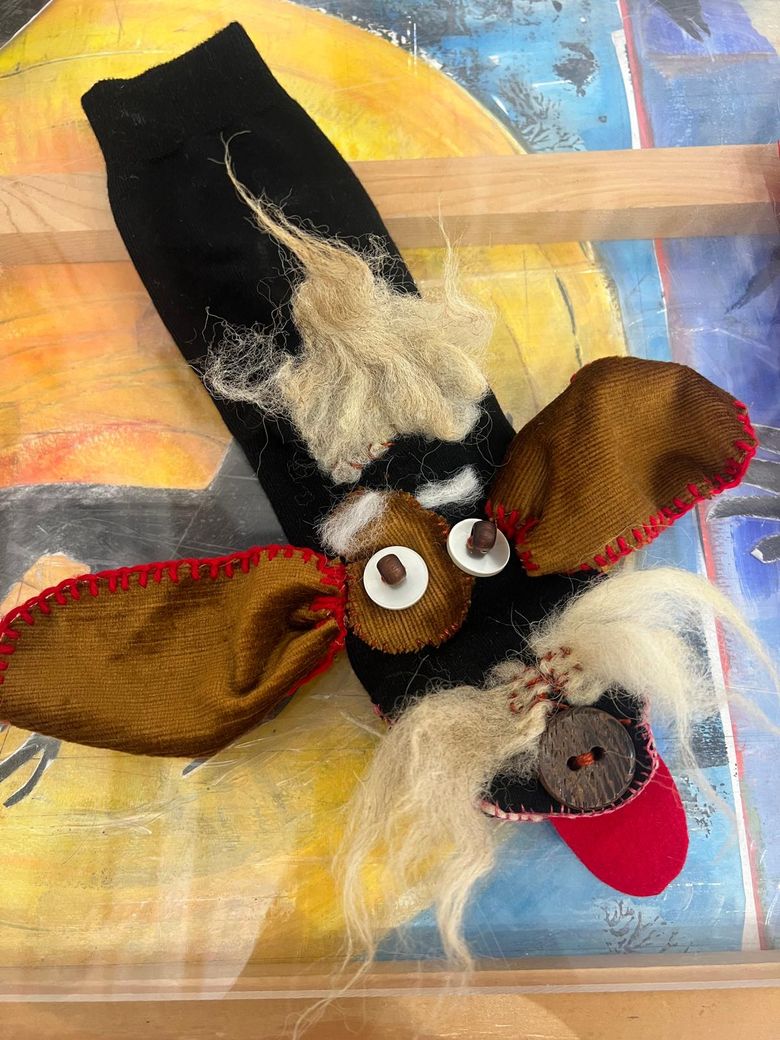 Pop van een sok gemaakt