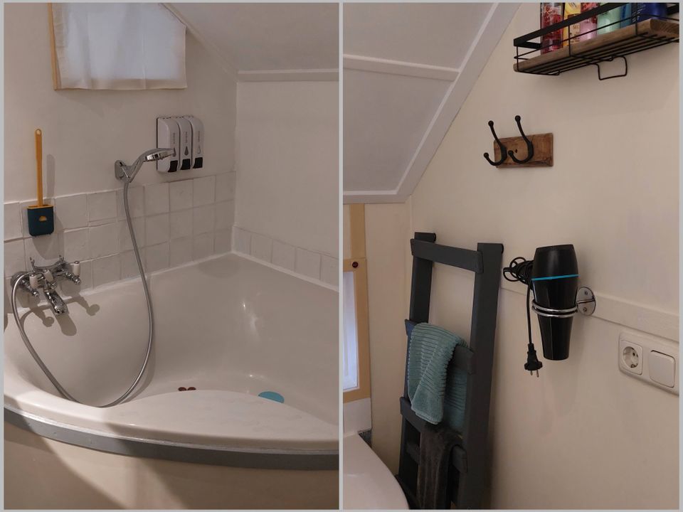 Badkamer met hoekbad en zitdouche.