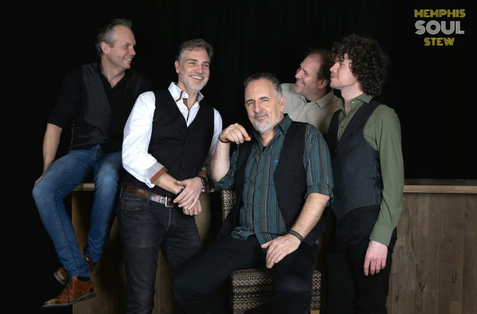 Bandfoto van 5 mannen