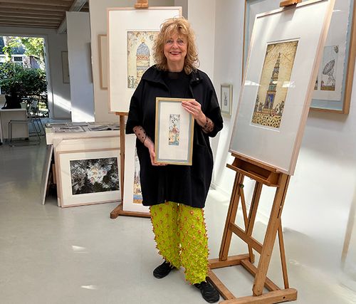 Gea Karhof surrounded by her artworks