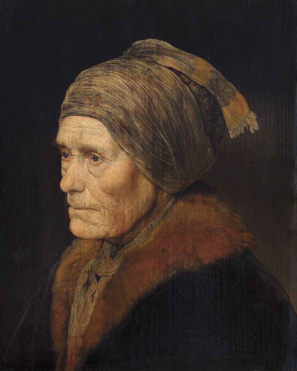 an old woman painting