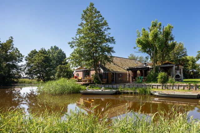 Het buitenaanzicht van Vakantieboerderij Landelijk Genieten