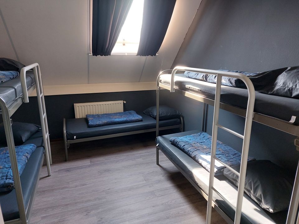 One of 13 bedrooms in De Boerderij. There are bedrooms that sleep 4 to 8 people.