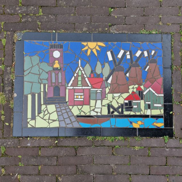 Een Tegelmozaïek in de Kerkstraat in Oostzaan